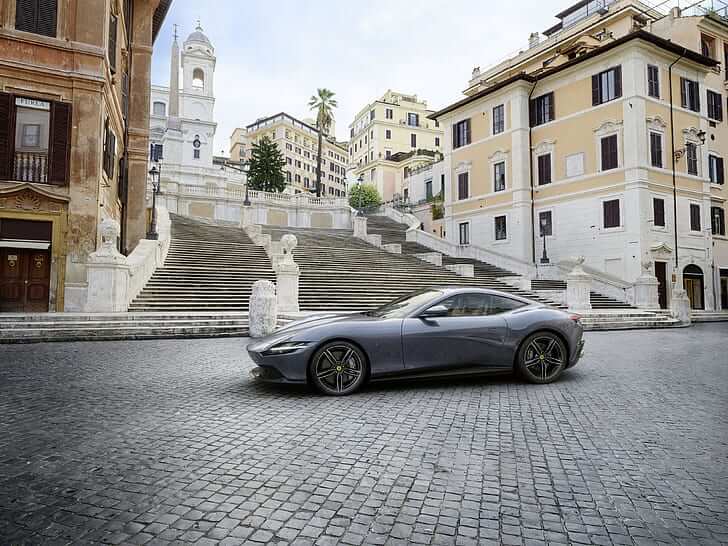 a car parked in a courtyard, Car Hire in Rome