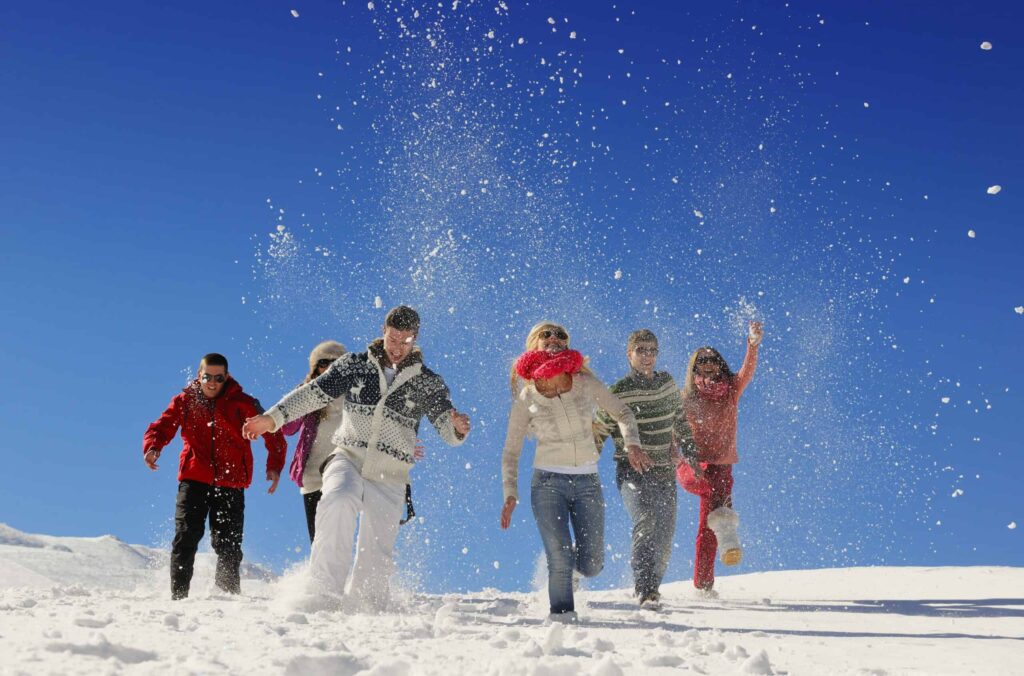 vecteezy friends have fun at winter on fresh snow 11598948 scaled 1