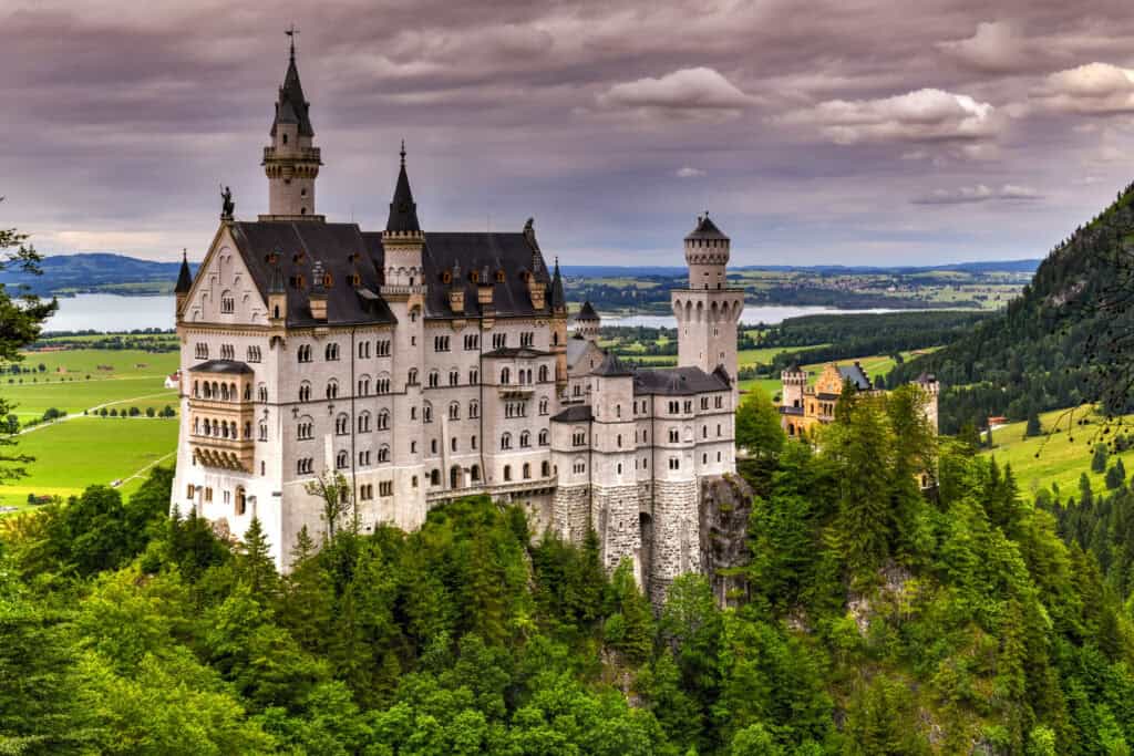 World-famous Neuschwanstein Castle, the nineteenth-century Romanesque Revival palace built for King Ludwig II on a rugged cliff near Fussen, southwest Bavaria, Germany, How Many Castles Are in Germany? Explore German Castle History